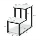 Three-tier side table in white with black steel frame, featuring ample storage space and a unique stair-step design.